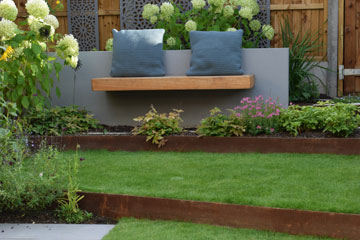 Small garden with terraced lawn in Ealing